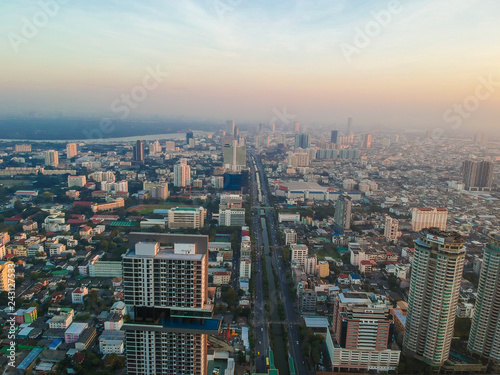 Aerial view of Bangkok modern office city building colorful sunrise