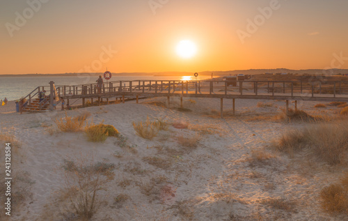 Sunset at the end of a beach day at Praia dos Tres Irmaos in Alvor at the Algarve Coast near Lagos © mmuenzl