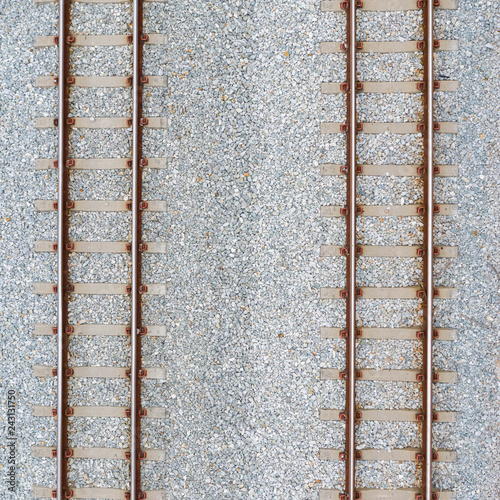 Obraz na plátně Top view of railroad tracks and abstract background