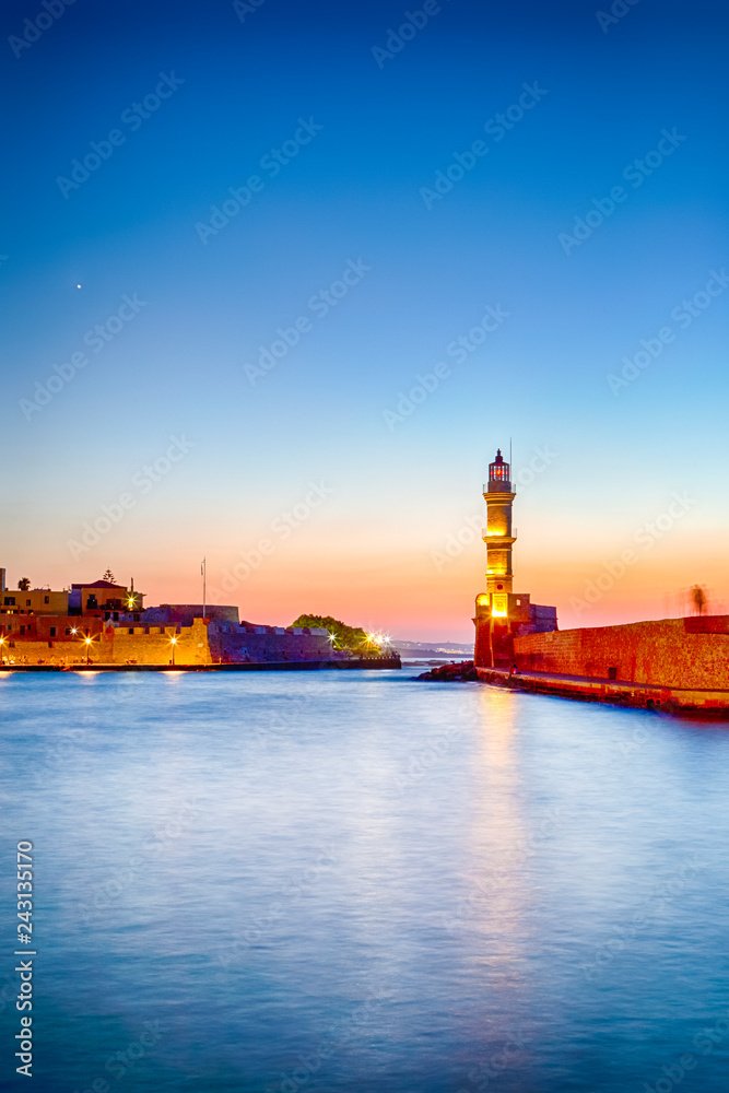 Old Venetian Port in Chania and Ancient Lighthouse on Pier.