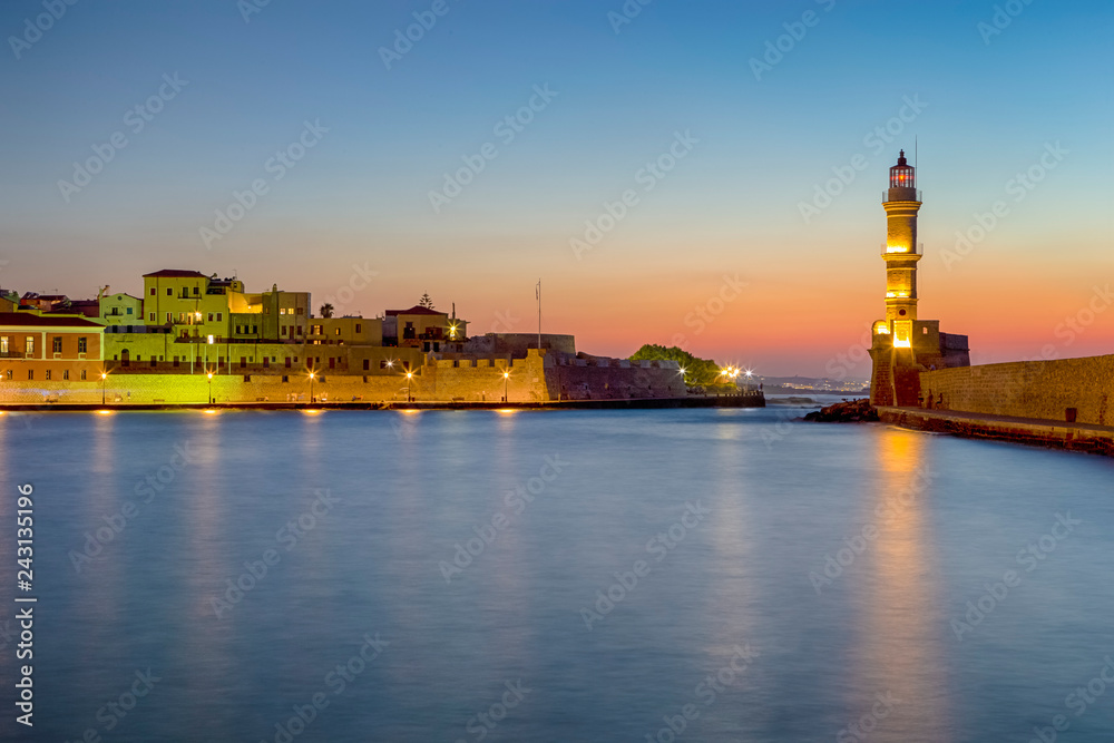 Picturesque View of Old Center of Chania  with Ancient Venetian Port and Ligthouse At Blue Hour in Crete, Greece.