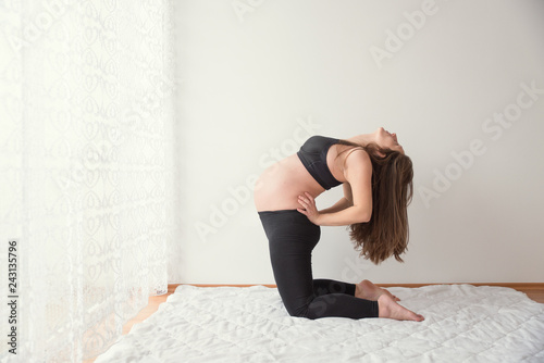 Pregnant woman doing yoga