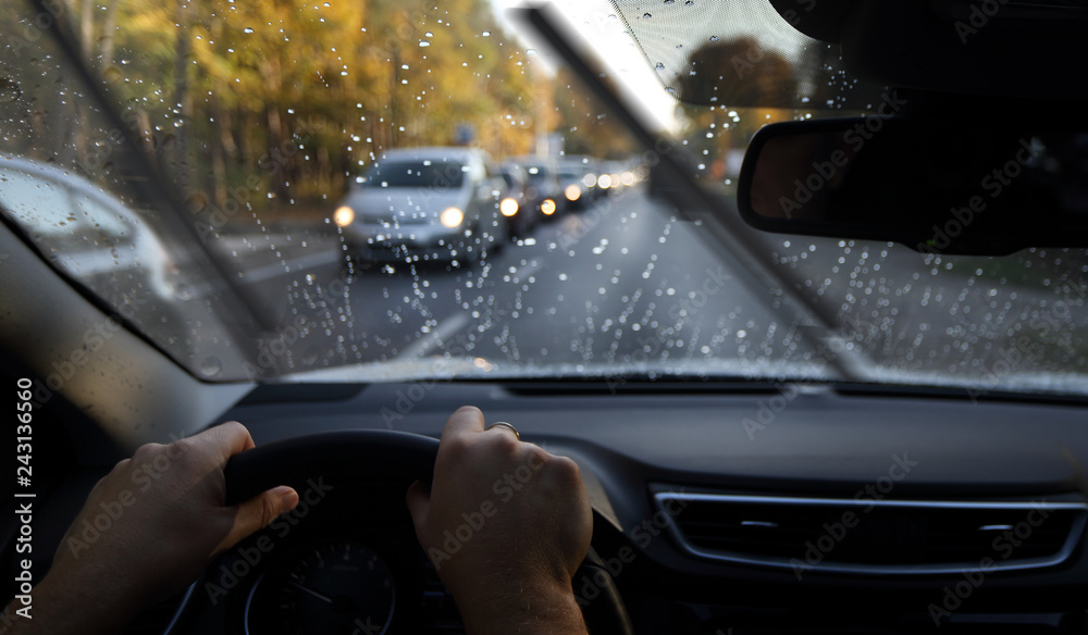 driving in a rainy day by car - obrazy, fototapety, plakaty 