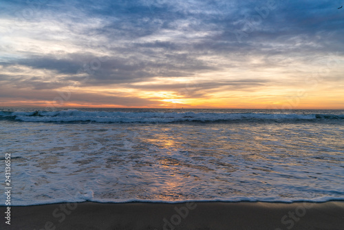 View of sea and waves at sunset © Roberto Vivancos