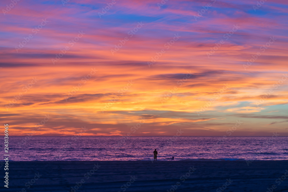 View of sea, clouds and waves at sunset