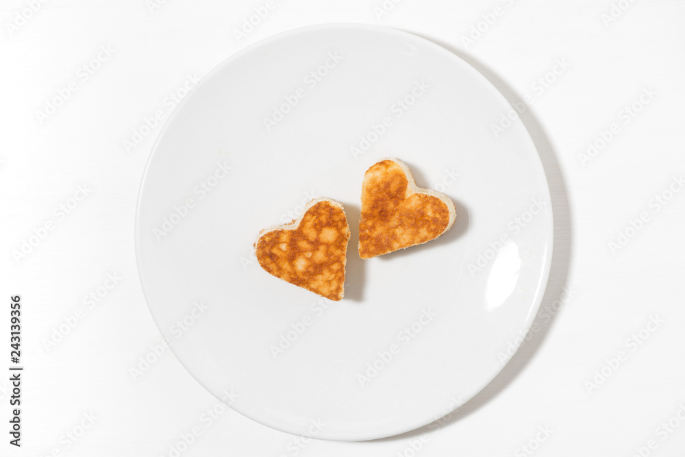 plate of pancakes in the shape of heart, top view plate of pancakes in the shape of heart, top view