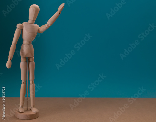 Wooden mannequin. Saying hello. Greetings. Thank you. Concept.