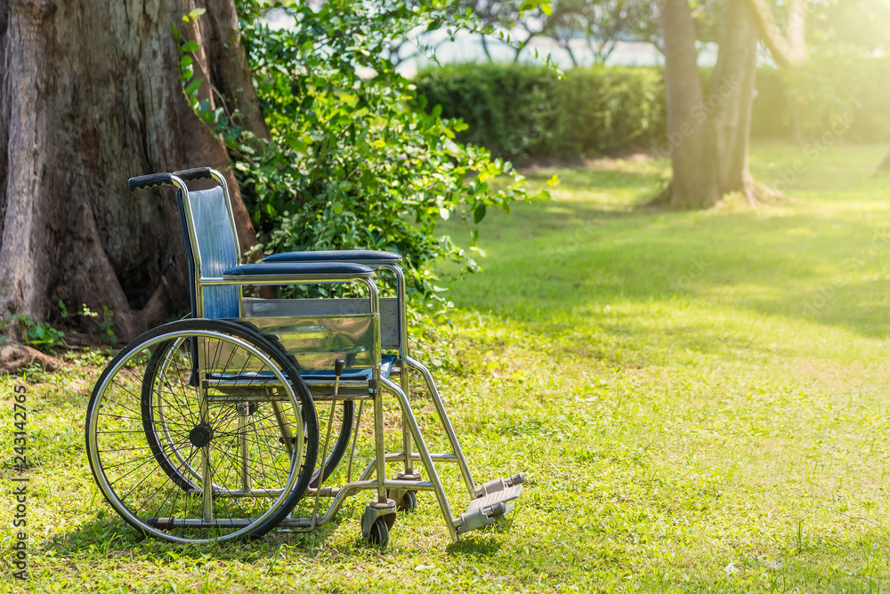 Empty wheelchair in the garden.thailand. Empty wheelchair in the garden.thailand.