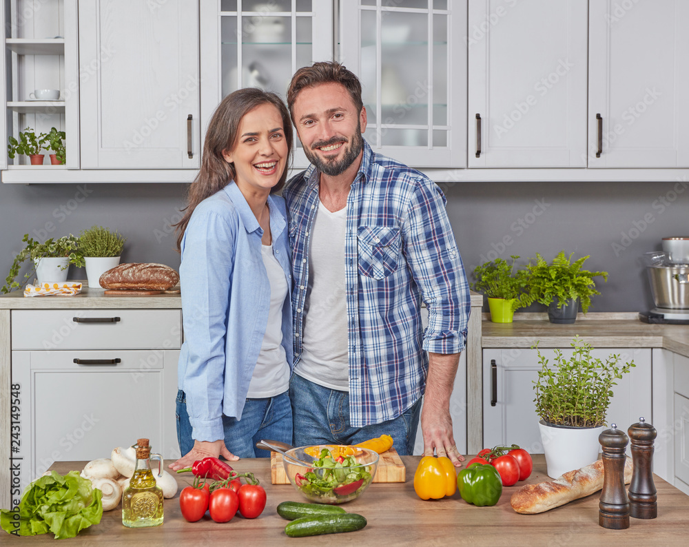 Couple in love preparing dinner Couple in love preparing dinner