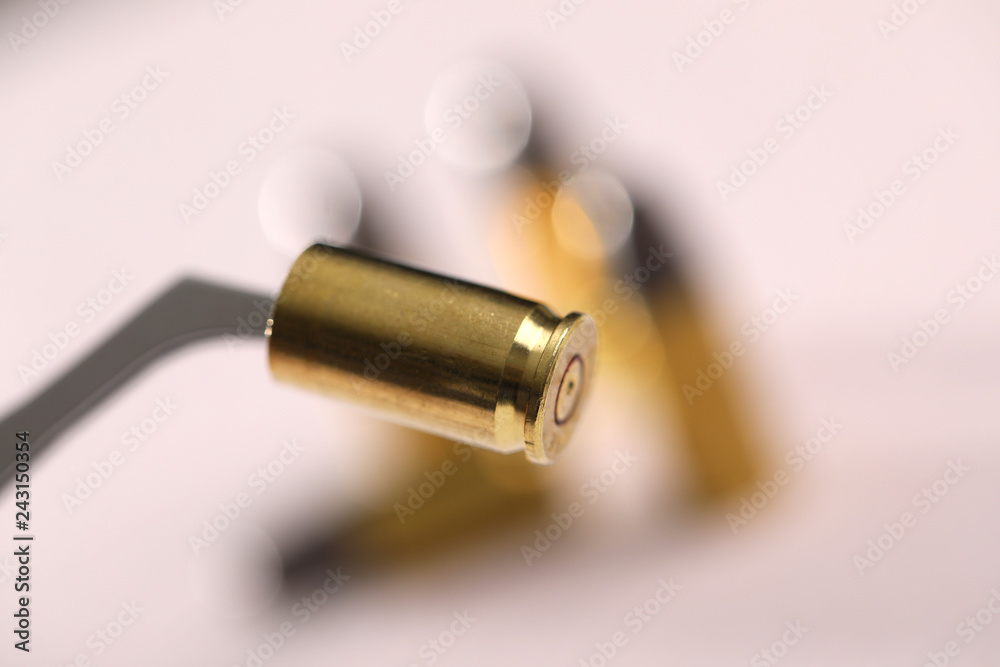 Gun bullet holding with tweezer Gun bullet holding with tweezer