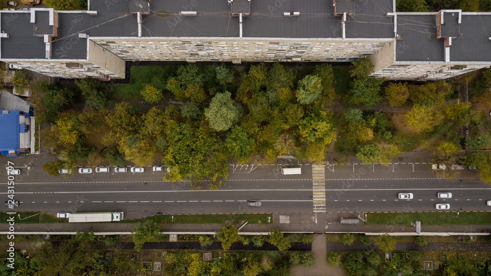 Top down view of buildings, street roads with cars in Krasnodar city, Russia