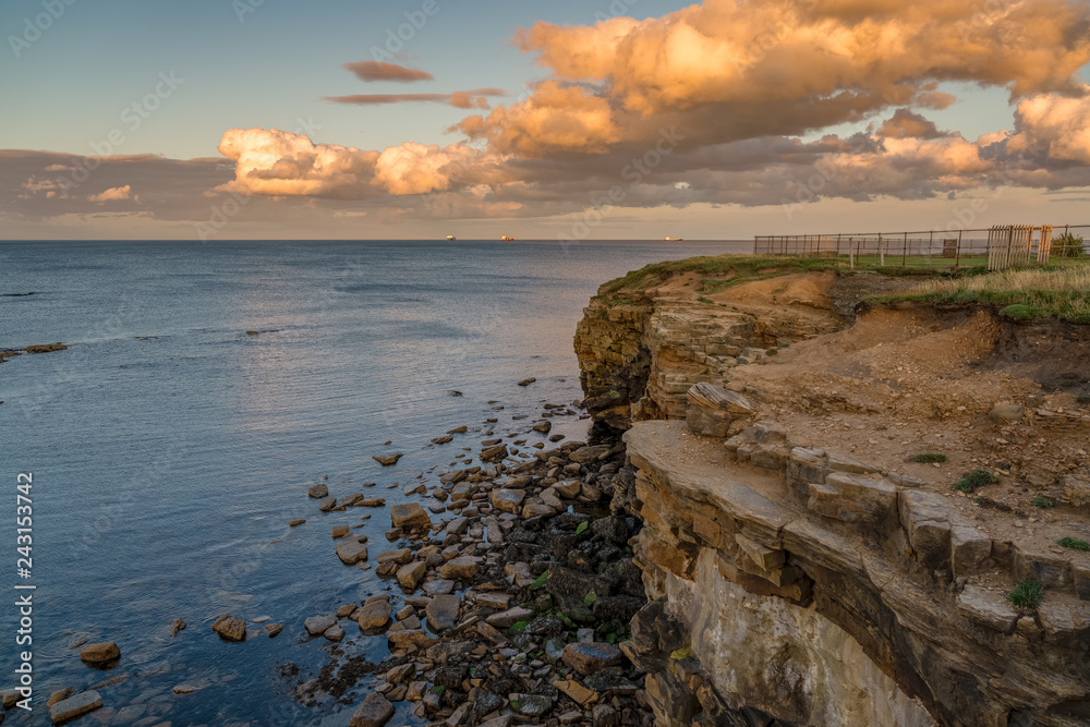 Evening Clouds and cliffs on the North Sea Coast in Whitley Bay, Tyne And Wear, England, UK