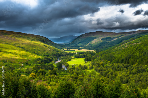 Corrieshalloch Gorge National Nature Reserve With River Through Pasture Valley And Loch Broom In Scotland photo