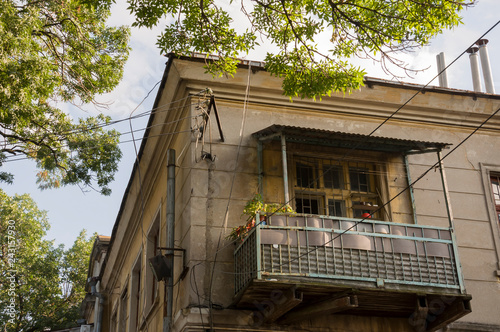 Old city buildings before and after restavration. Ancient windows, roofs, balconies. sculptures, walls  © Oksana