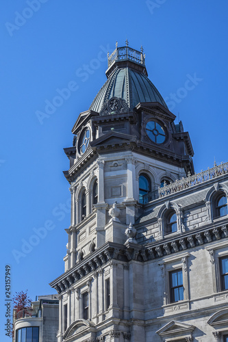 Victorian building surmounted by a copper dome (1878). This Magnificent building first housed offices of the Commissioners (edifice des commissaires) of the Port of Montreal. Montreal, Quebec, Canada.