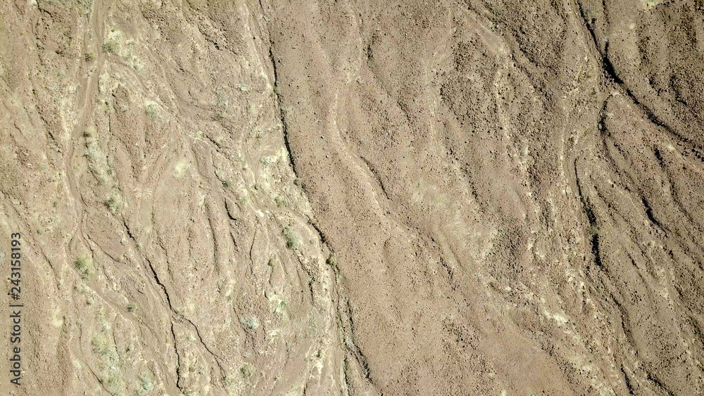 Desert landscape - Aerial image of mountains and dry land Desert landscape - Aerial image of mountains and dry land