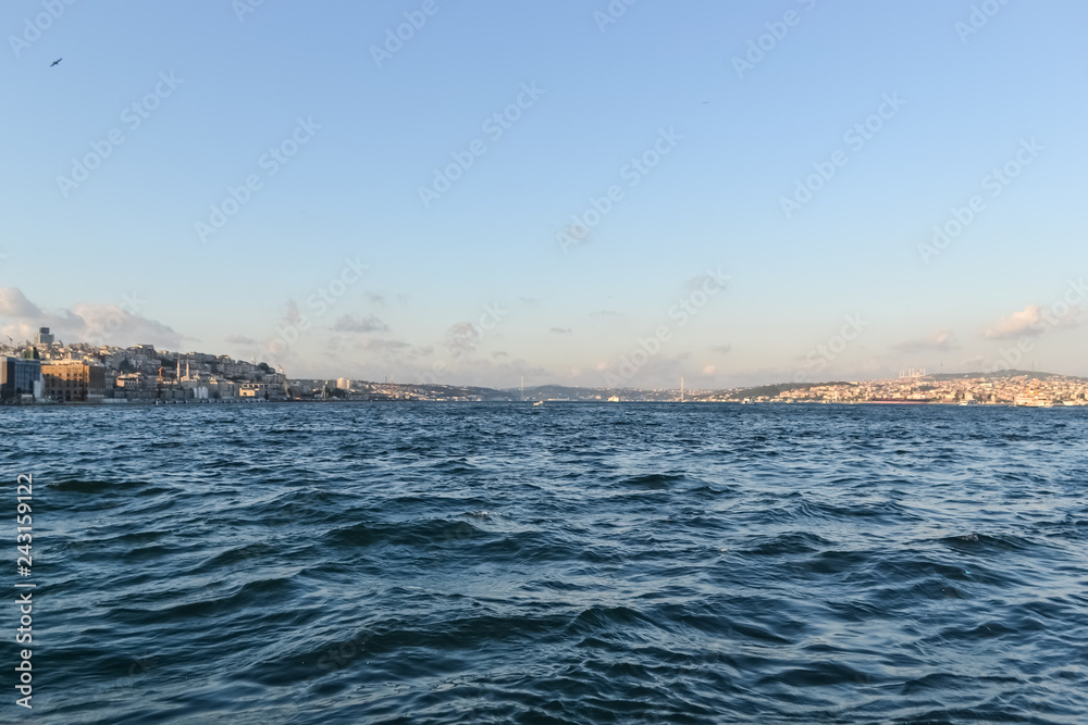 Obraz premium sea Strait view of the opposite shore. blue sea horizon clouds