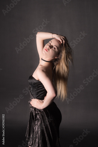 sensual girl in a black dress