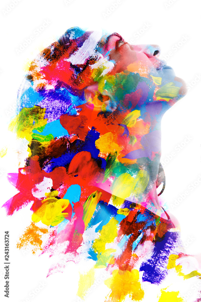 Paintography. Double exposure. Close up of an attractive peaceful model combined with colorful hand drawn acryllic paintings with overlapping brushstroke texture