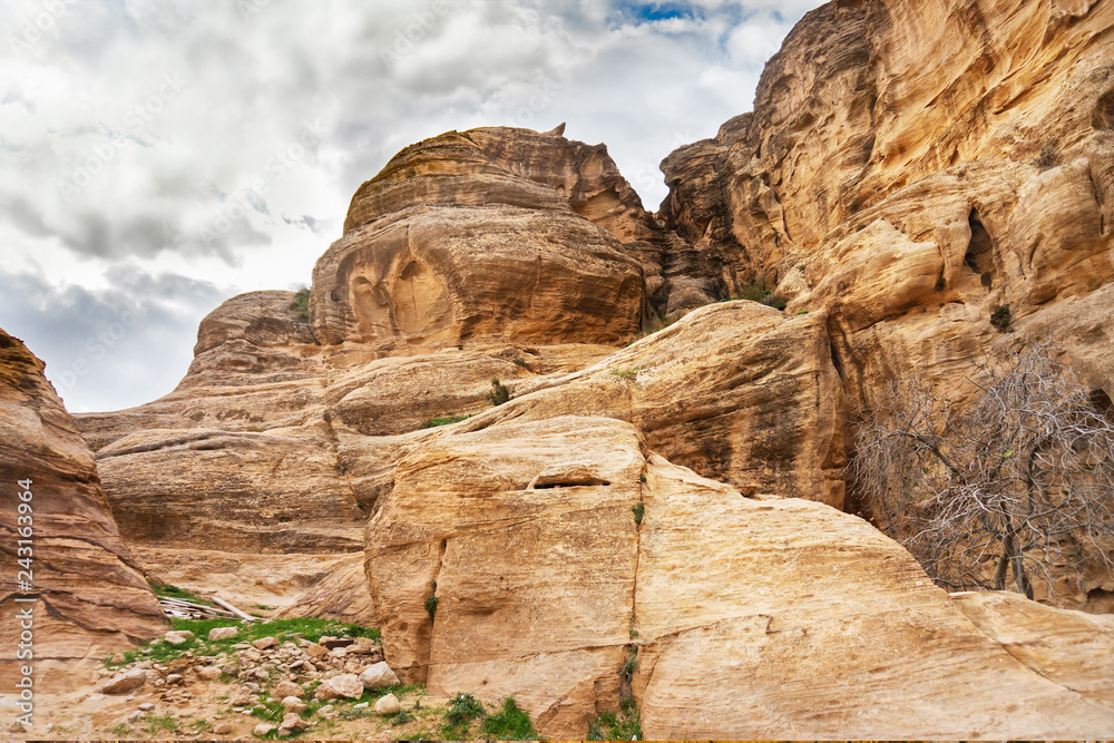 Rocks in mountains of Petra on cloudy day