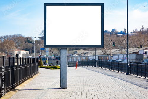 Blank white mockup of billboard in empty Istanbul street