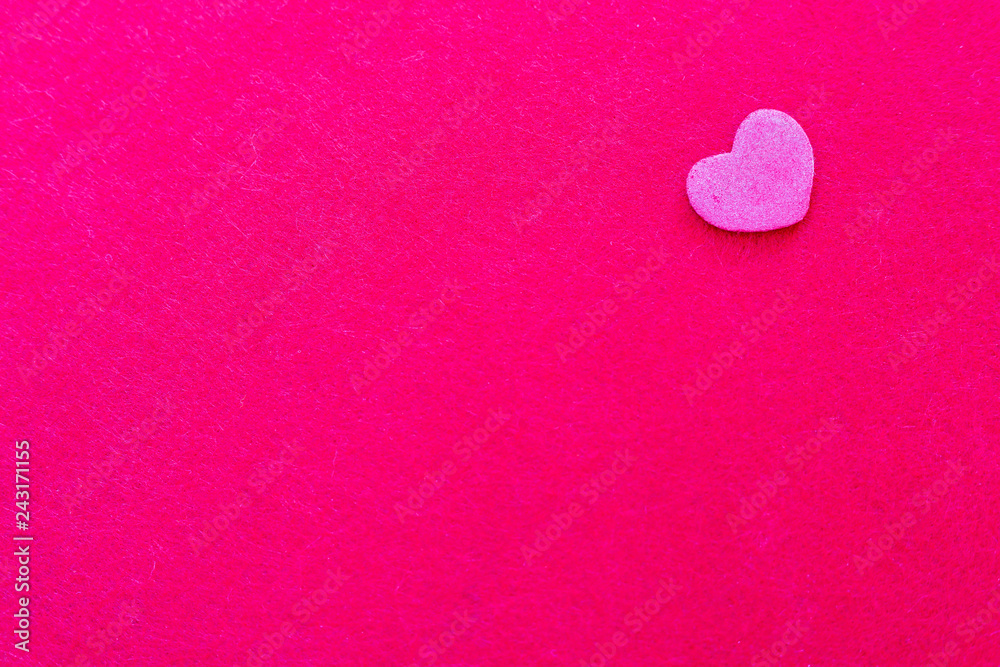 Fototapeta premium Pink heart shape on pink background