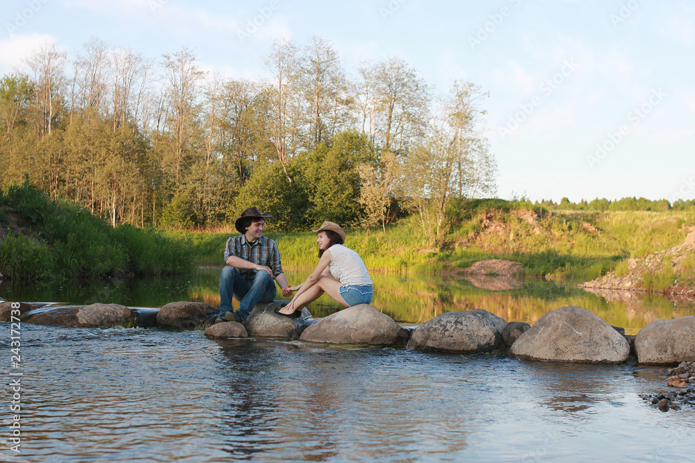 Cute couple on a walk by the countryside Cute couple on a walk by the countryside