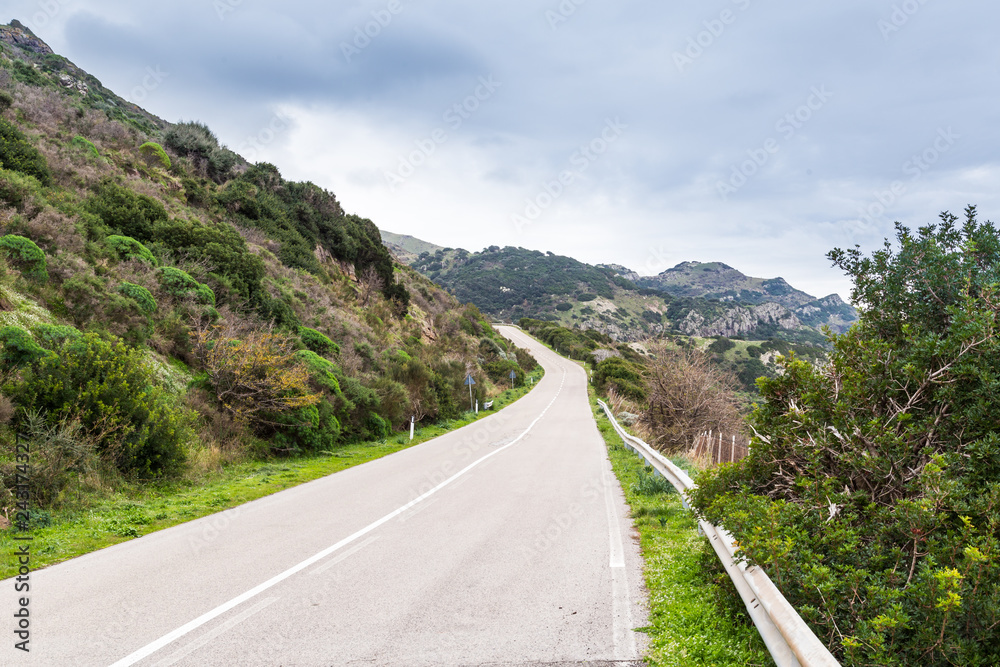 Mountain coast road betrween Bosa and Algharo in Sardinia, Italy