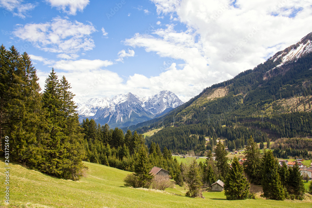 View of the majestic Zugspitze mountain from the alp meadows of Lähn, Tyrol, Austria.