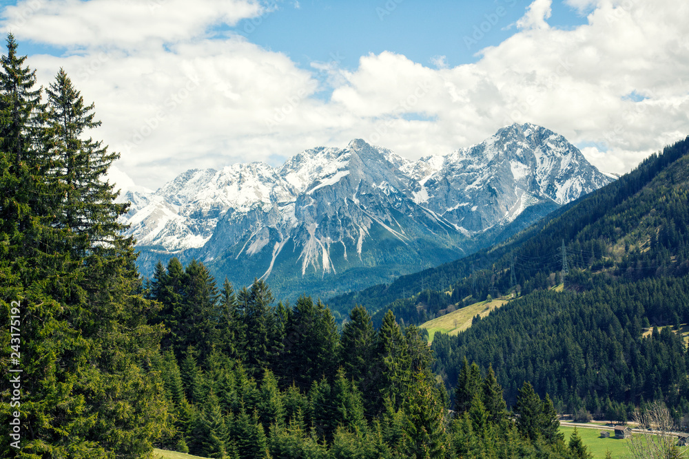 View of the majestic Zugspitze mountain from the alp meadows of Lähn, Tyrol, Austria.