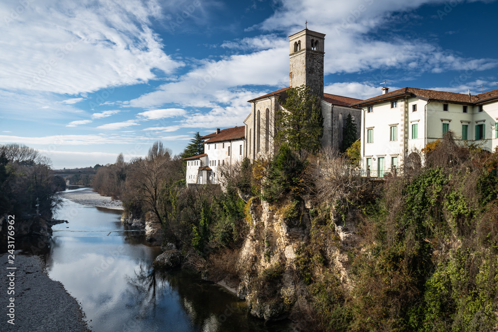 town of cividale del friuli in sunny winter, view from bridge ponte del diavolo, italy