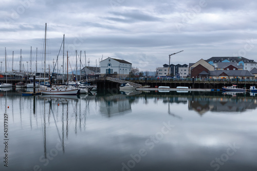 Carrickfergus Harbour with boats and reflection © lisandrotrarbach