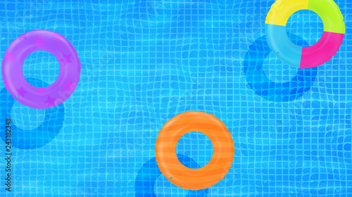 Swim rings on swimming pool water background. Inflatable rubber toy. Realistic summertime illustration. Summer vacation or trip safety item. Top view swimming circles.