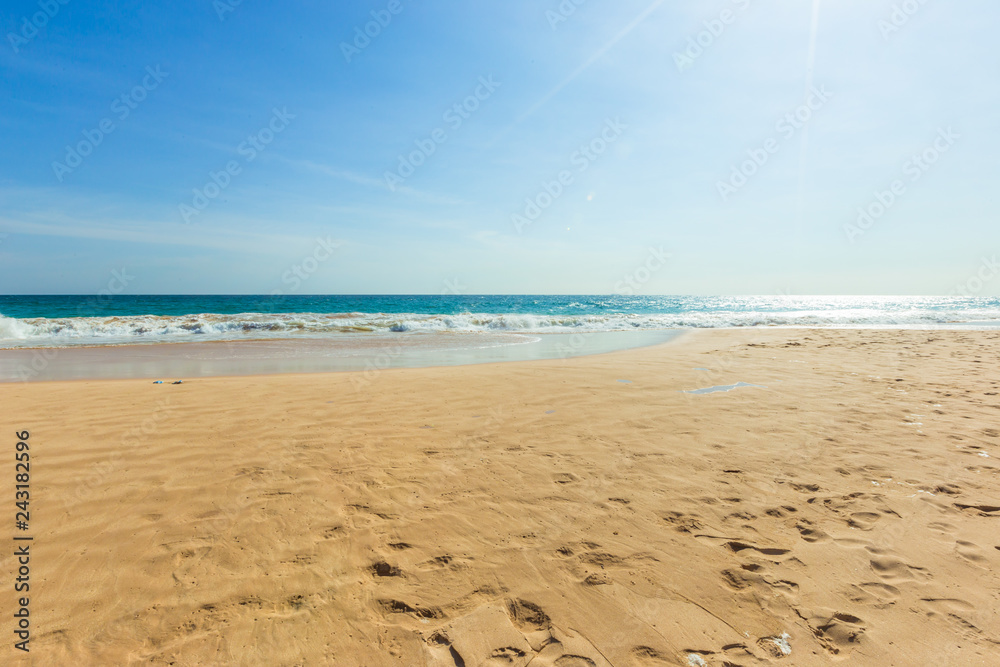 Untouched tropical beach in Sri Lanka with white sand and blue water Untouched tropical beach in Sri Lanka with white sand and blue water