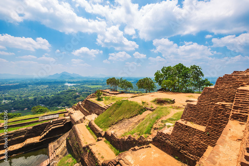 Sigiriya Rock or Lion Rock is an ancient fortress near Dambulla, Sri Lanka. Sigiriya is a UNESCO World Heritage Site. photo