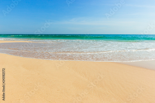 Untouched tropical beach in Sri Lanka with white sand and blue water