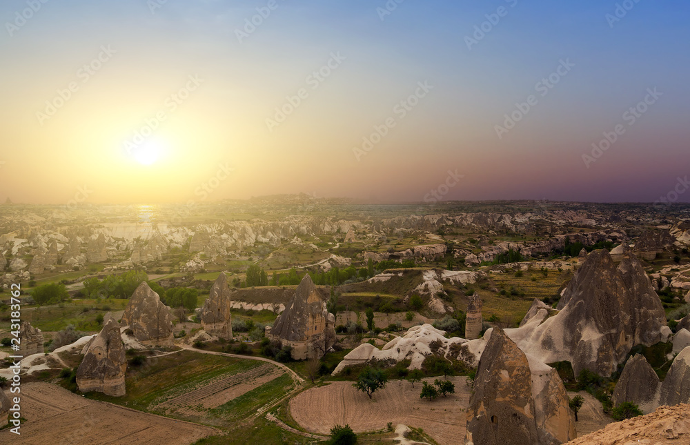 Obraz premium Spring sunrise cave houses of Cappadocia