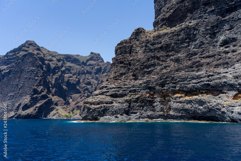 Vertical cliffs Acantilados de Los Gigantes (Cliffs of the Giants). View from Atlantic Ocean. Tenerife. Canary Islands. Spain.
