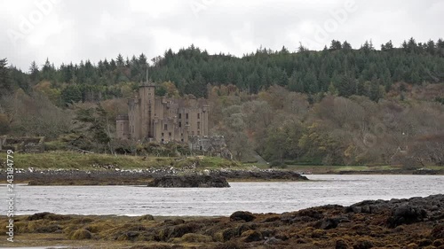 Dunvegan castle on the Isle of Skye - the seat of the MacLeod of MacLeod, Scotland, UK photo