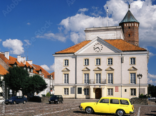 Pultusk, Poland - July, 2004: Town hall at market square photo