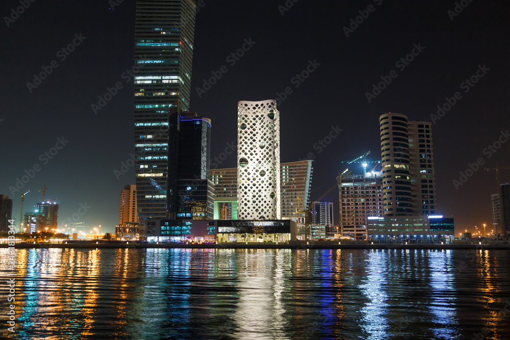 night skyscrapers city with with water reflection
