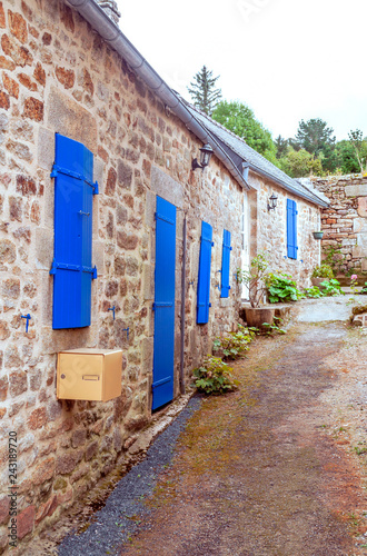 Chateaulin with its stone houses on a cloudy day. It is located in French Brittany. photo