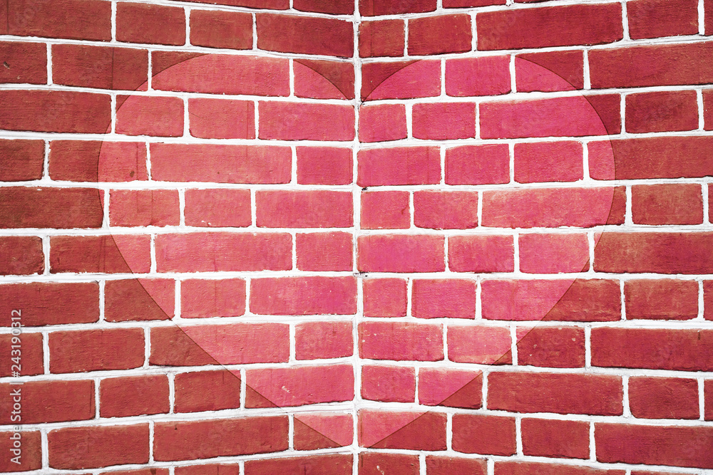 Obraz premium Symmetric pink drawn heart on red brick wall close-up. Background with painted heart. Interior with love symbol decor. Valentine day image on wall. Brickwork with exterior picture. Angle of brick wall
