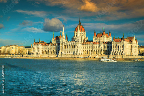 Spectacular and famous Hungarian parliament at sunset with Danube river