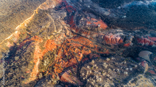 Aerial view in sunset, about an abandoned bauxite mine in Gant