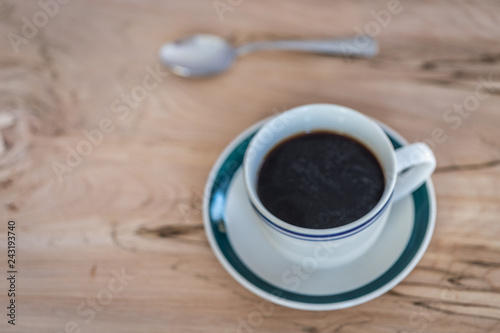 Aerial view of a cup of coffee with a spoon