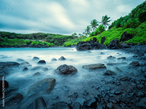 This photo is from Waianapanapa State Park in Maui, Hawaii, which is just outside of Hana.  Black sand beach can be seen in the distance. photo