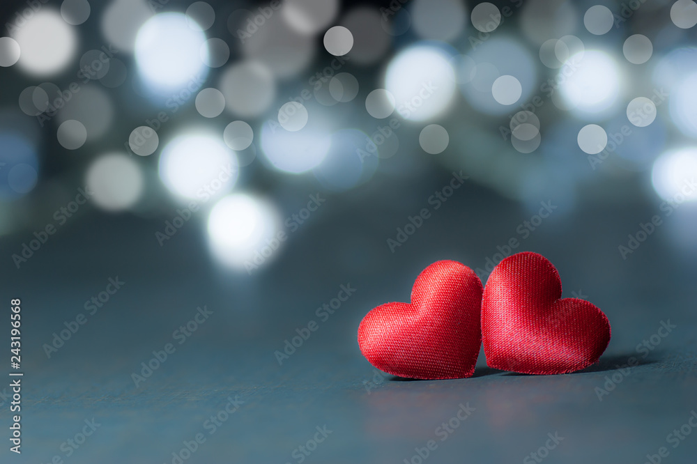 two Red Heart bokeh bright background on wooden backdrop . Happy valentines day. St. Valentine background. Holidays greeting card copy space