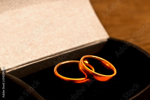 Two wedding rings in black box photo