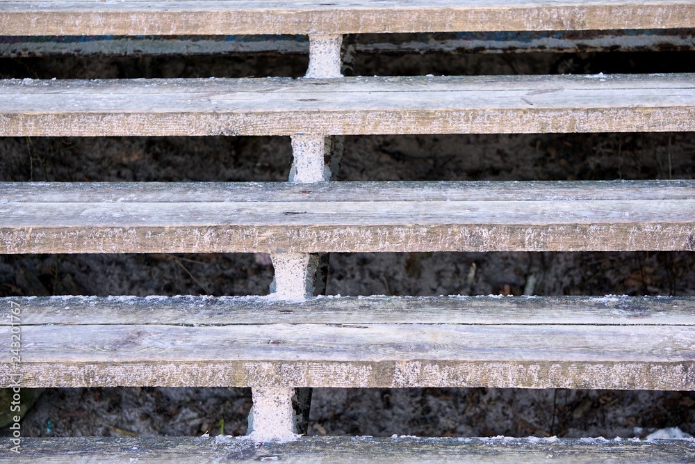 wooden staircase. winter. frozen stairs. winter background wooden staircase. winter. frozen stairs. winter background